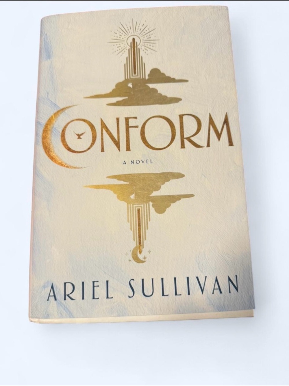 Conform by Ariel Sullivan - Hardcover Novel in Gold and Cream